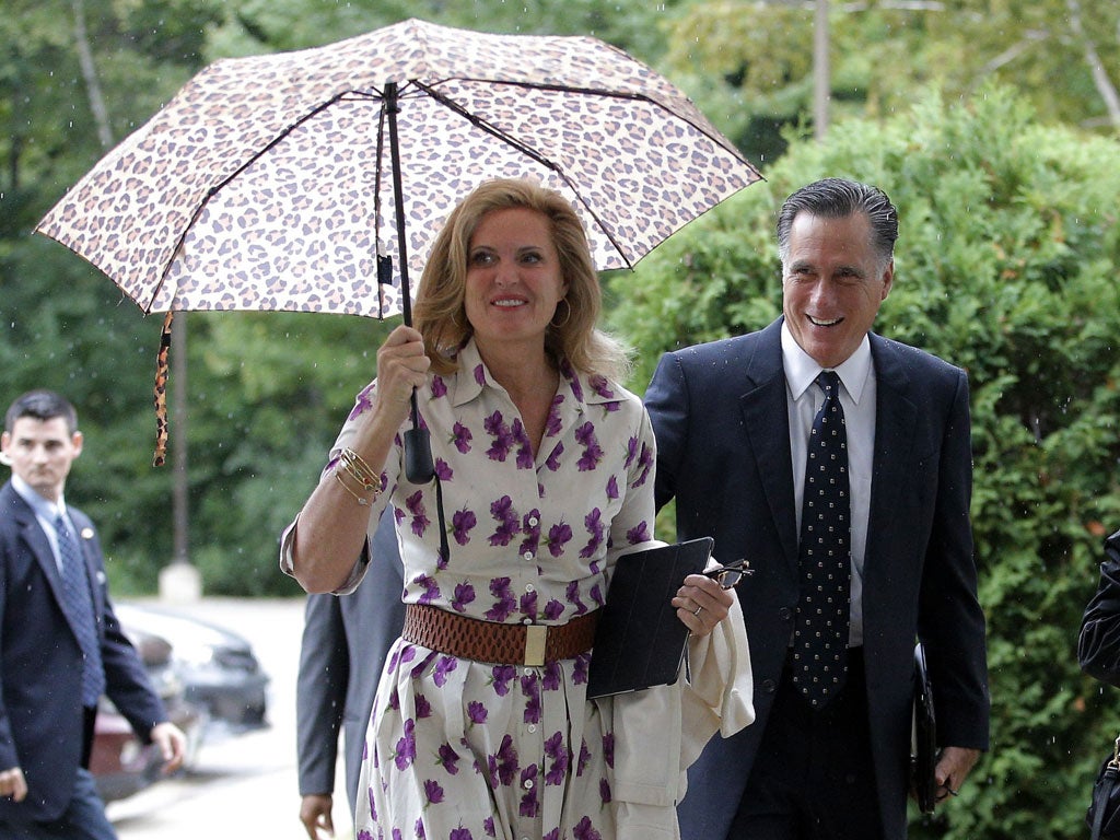 Mitt Romney and his wife Ann arrive for church in New Hampshire yesterday