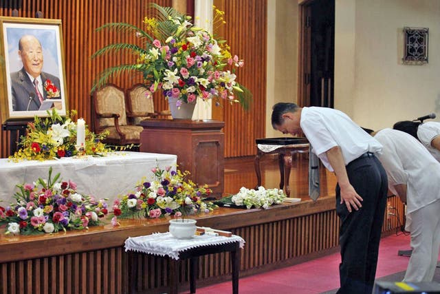 Followers pay their respects to the Rev Moon at a Church in Tokyo
yesterday
