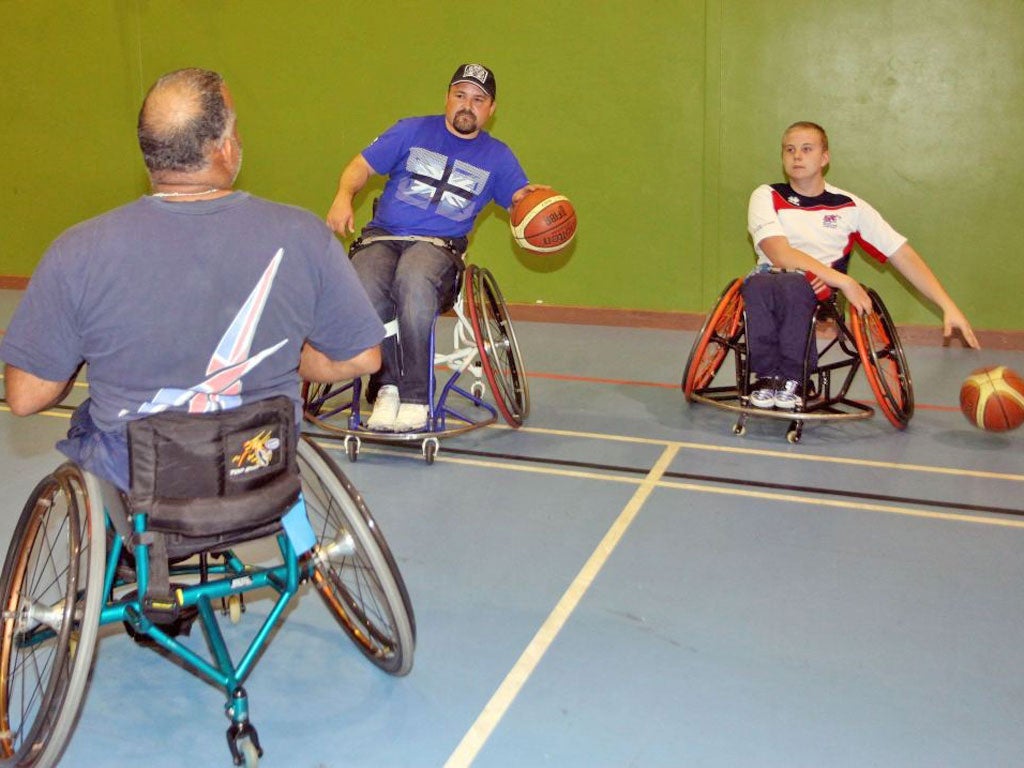 James Moore tests his skills with Roy Carter, left, and Jim Palmer