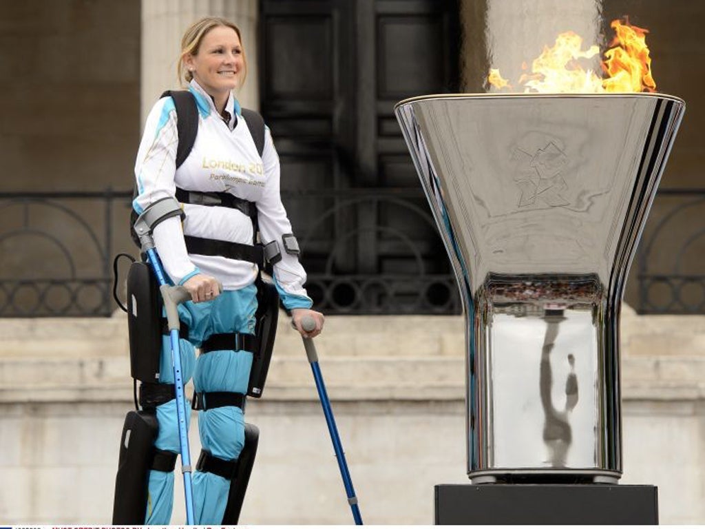 Claire Lomas with the Paralympic flame in Trafalgar Square