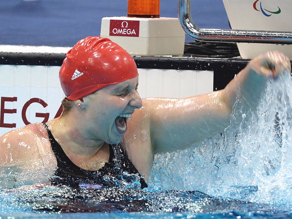 Heather Frederiksen celebrates gold, her second medal of the Games