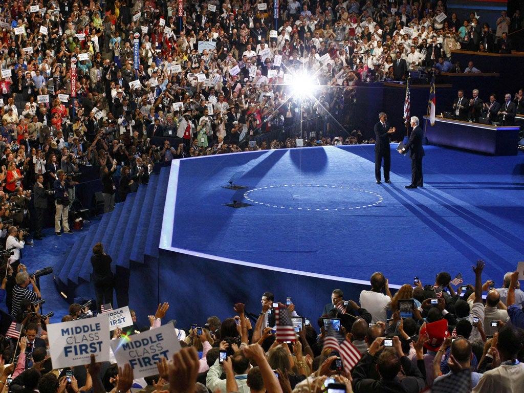 President Obama shakes hands with Bill Clinton after Wednesday's speech