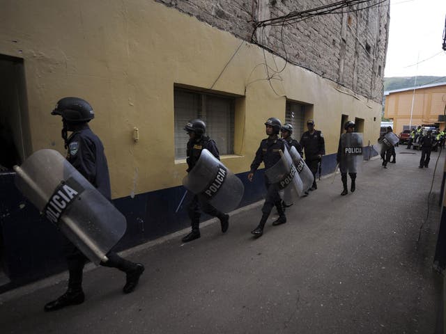 Riot police in the Honduran capital Tegucigalpa