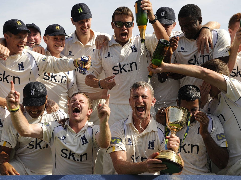 Warwickshire's captain, Jim Troughton, gets a soakin