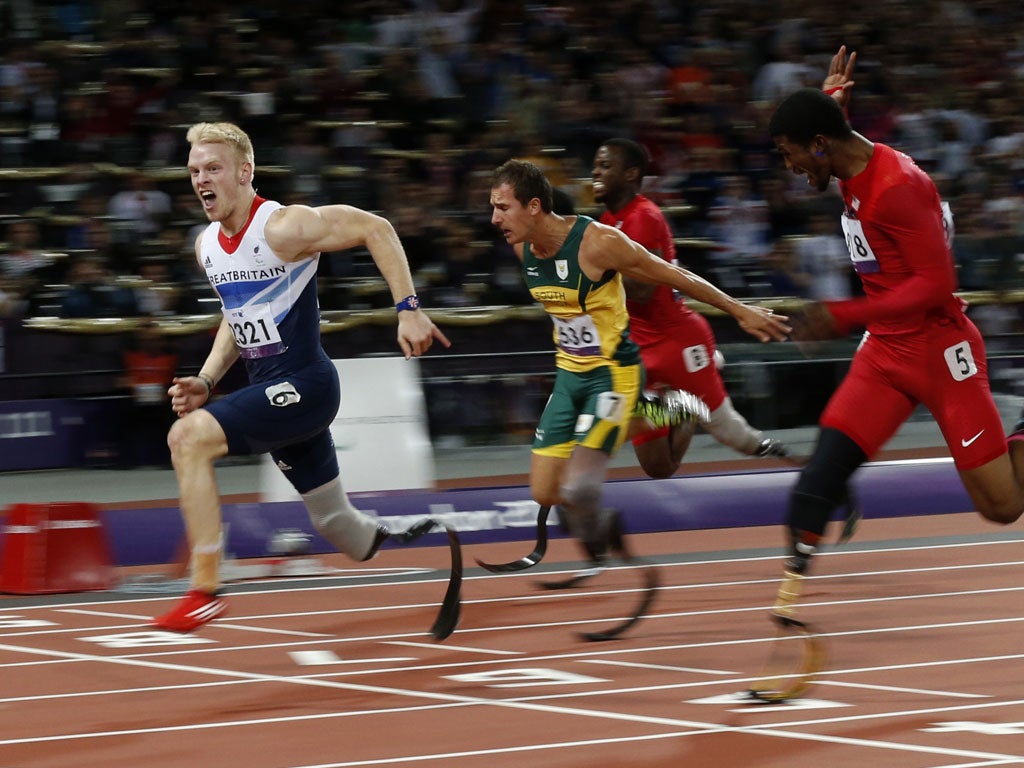 Flying Peacock: British sprinter storms to 100m title, leaving Blade Runner Pistorius trailing in his wake