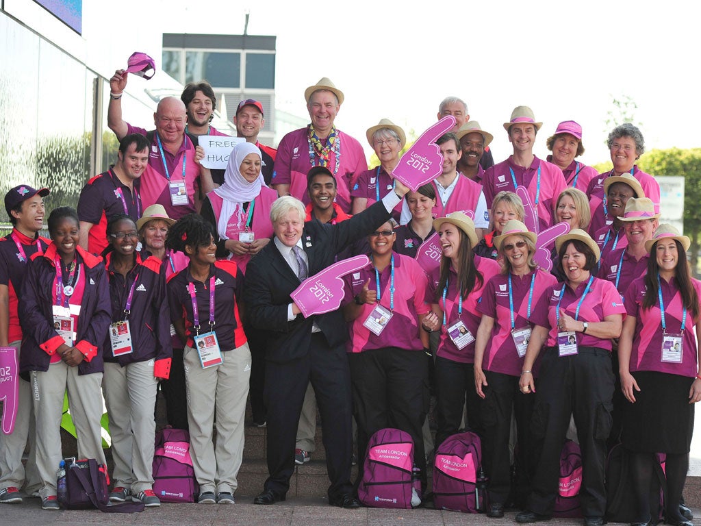 Boris Johnson celebrates a job well done with volunteering heroes yesterday