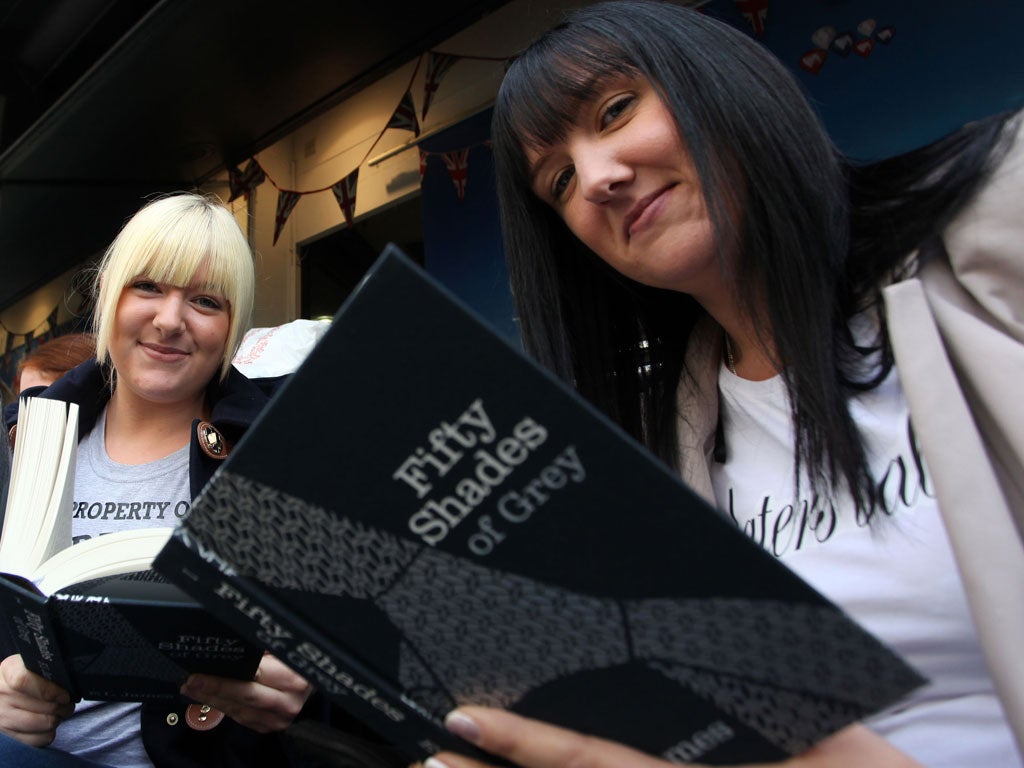 '50 Shades of Grey' book fans Joy and Hayley Ashforth (left to right) queued up outside Waterstones to get their books signed by author EL James