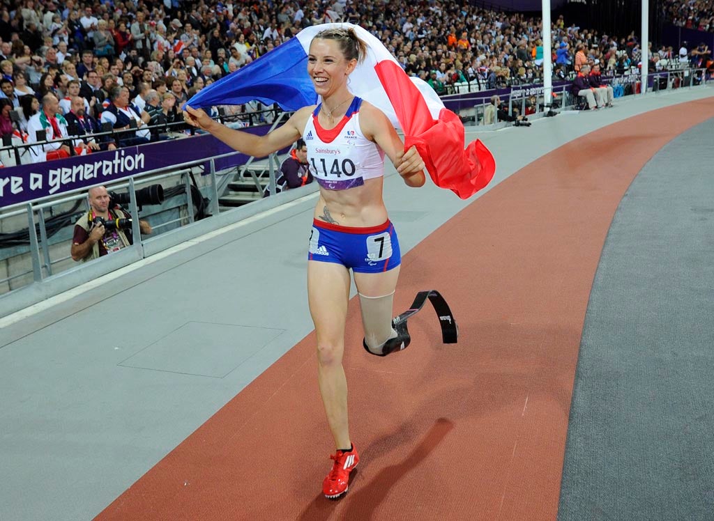 France's Marie-Amelie le Fur celebrates her silver medal in the women's 200m T44 final during the Paralympic Games.
