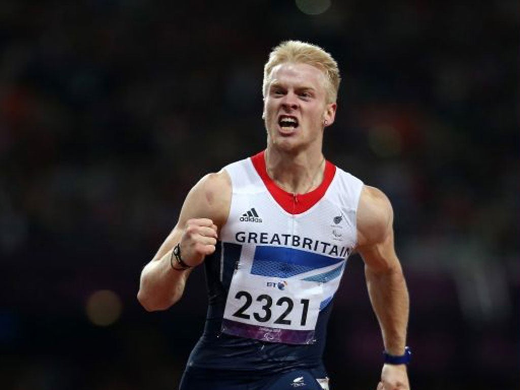Britain’s Jonnie Peacock enjoys winning gold in the 100m T44 final