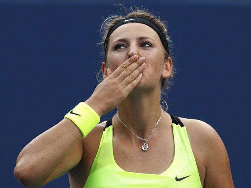 Victoria Azarenka blows a kiss to the crowd after her win