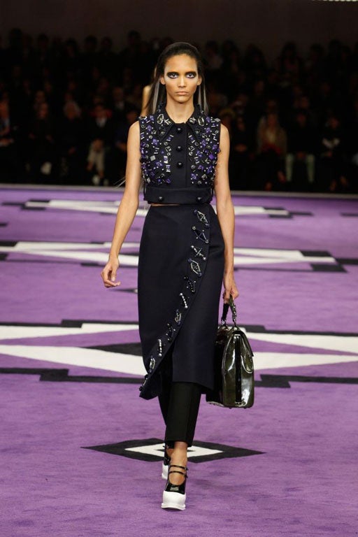 Purple may be the colour of the gods but both Christopher Kane (in London) and Miuccia Prada (in Milan) threw caution to the wind by covering their catwalks in it and sending out clothes to match