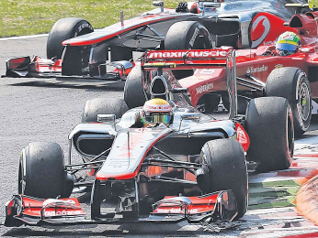 Lewis Hamilton leads from Felipe Massa and Jenson Button at
Monza
