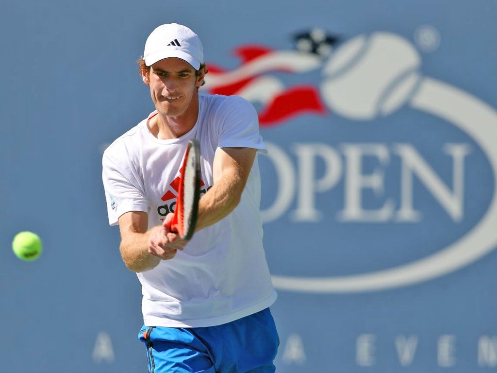 Andy Murray practises on Centre Court