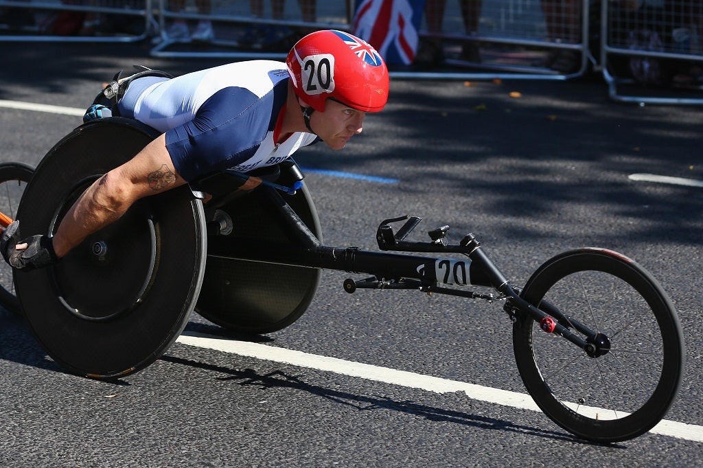 David Weir of Great Britain in the Mens T54 Marathon near the London eye. (Photo by Dean Mouhtaropoulos/Getty Image)