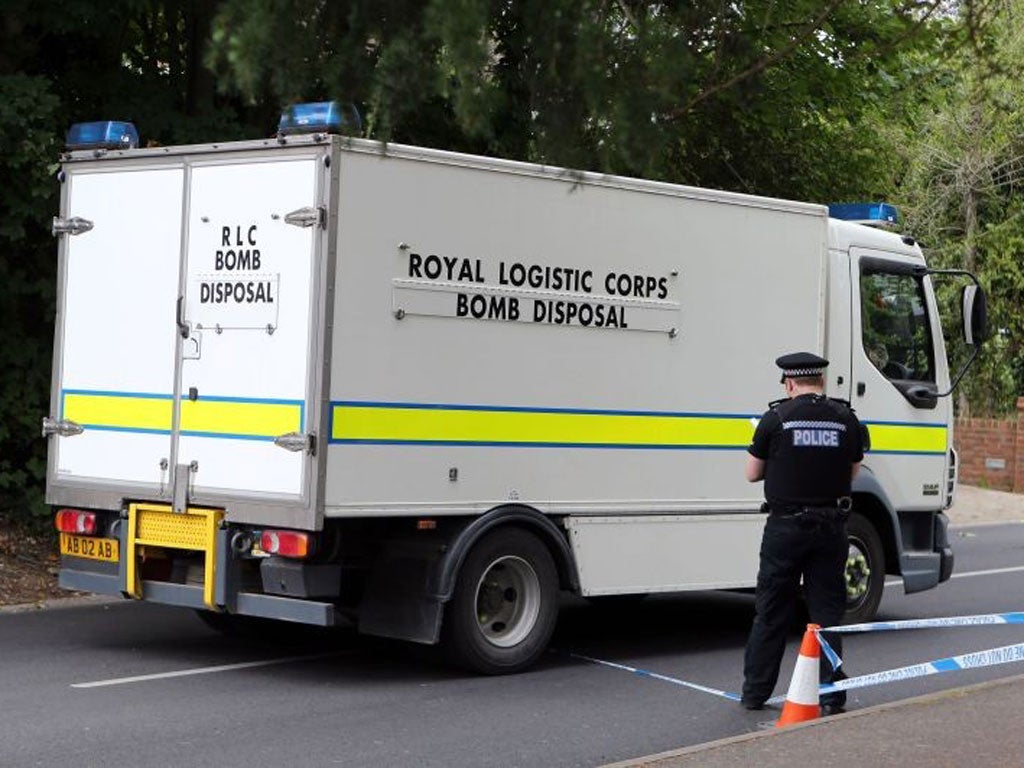 A Royal Logistic Corps bomb disposal truck close to the home of Saad al-Hilli in Claygate, Surrey