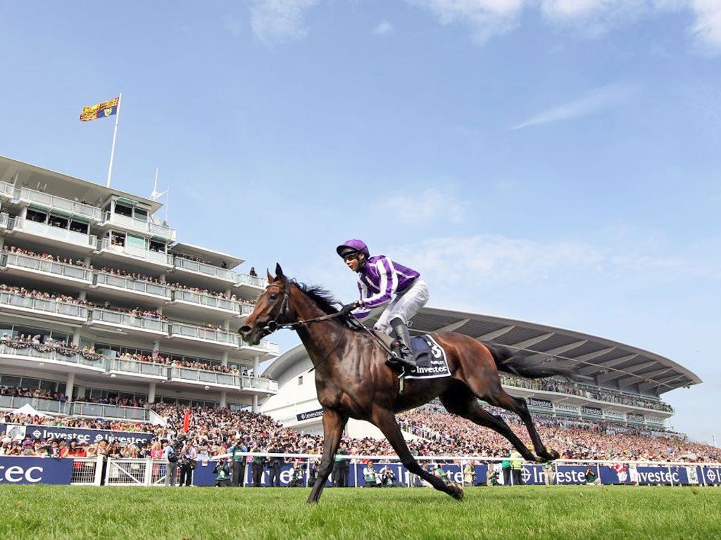 Camelot, ridden by Joseph O’Brien, on his way to glory in the Derby