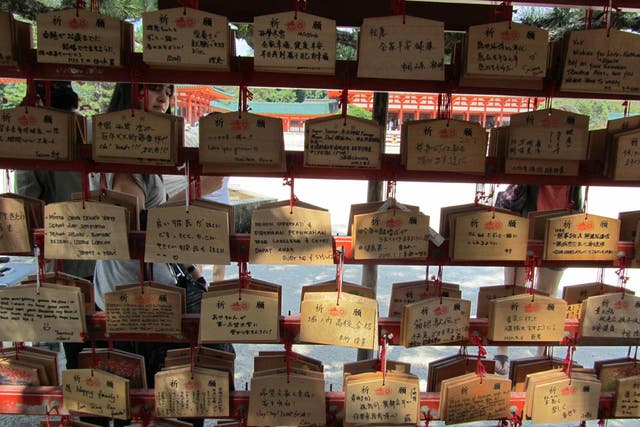 Studying Japanese gives you an insight into Japanese culture and international relations. This photo shows plaques depicting prayers and wishes in a shrine in Japan