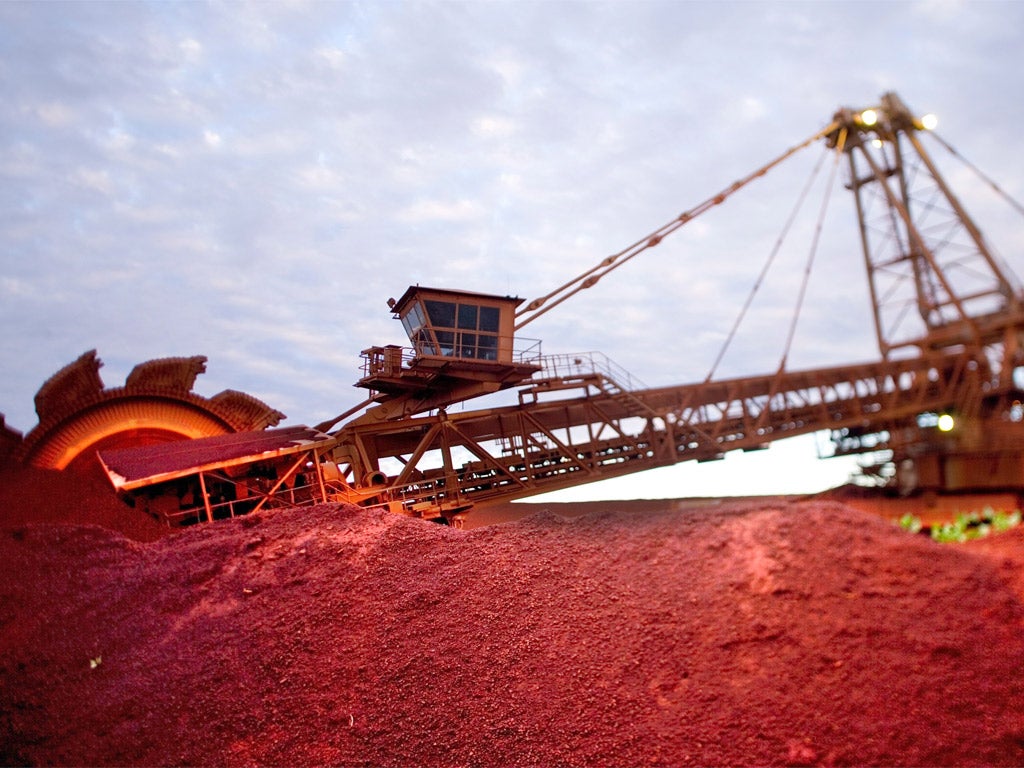 A reclaimer at work on a BHP Billiton iron ore stockpile at Port Hedland in Western Australia
