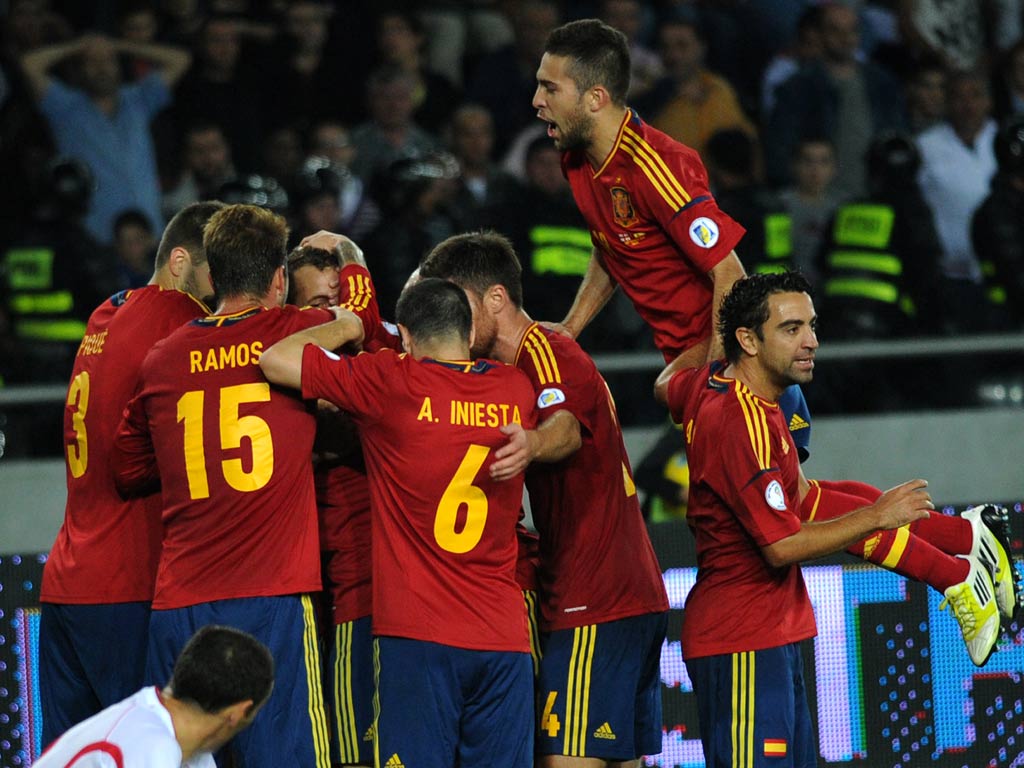 Spain celebrate their late goal against Georgia