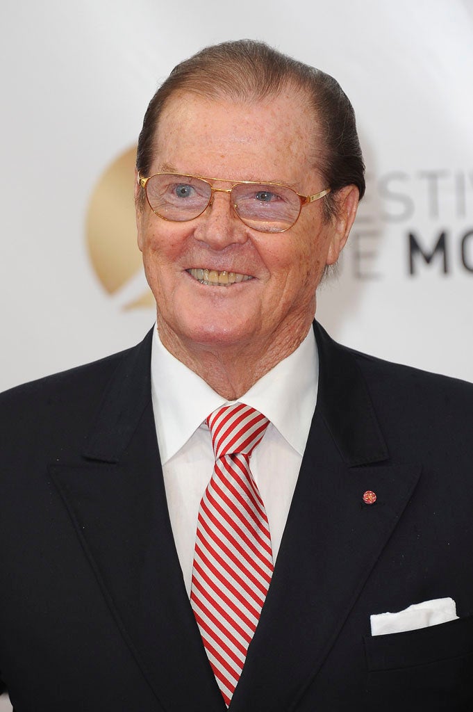 Sir Roger Moore claims to have suffered domestic violence from his first and second wives