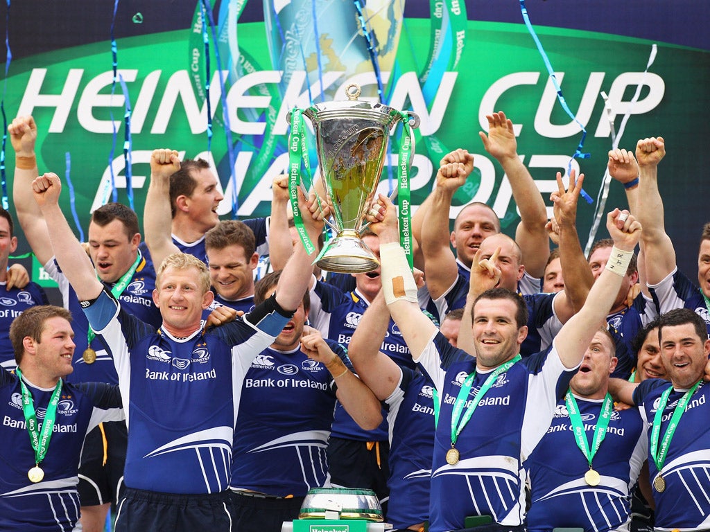 Leinster players lift the Heineken Cup after toppling Ulster at Twickenham earlier this year
