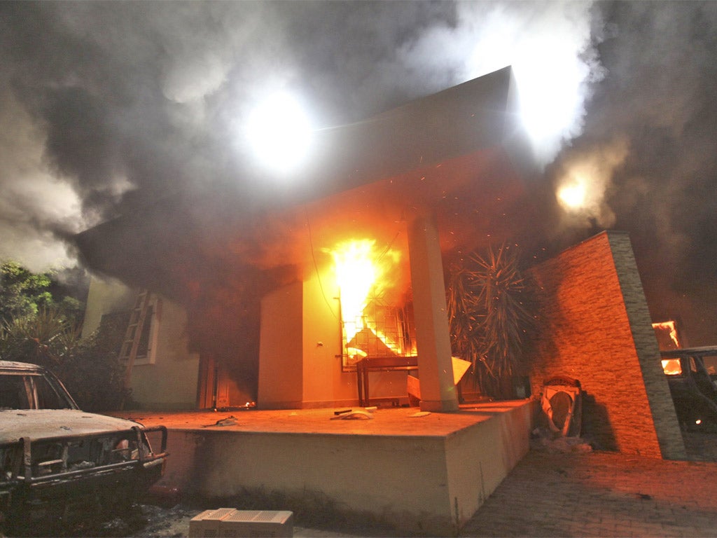 The US embassy ablaze after the attack by protesters