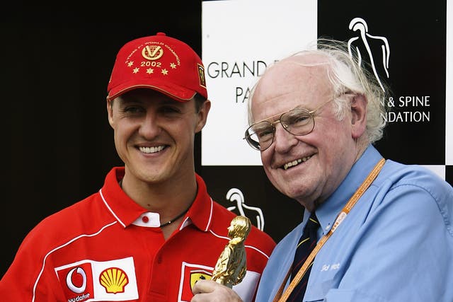 Sid Watkins (right) with former champion Michael Schumacher