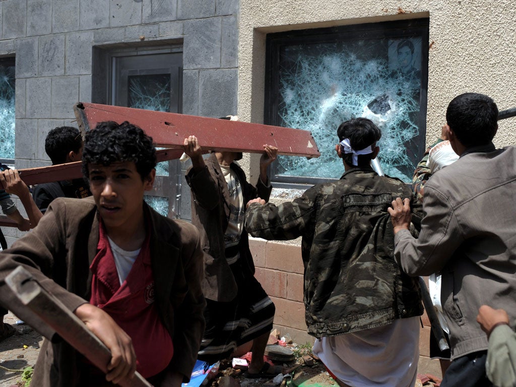 Yemeni protesters storm the US embassy yesterday