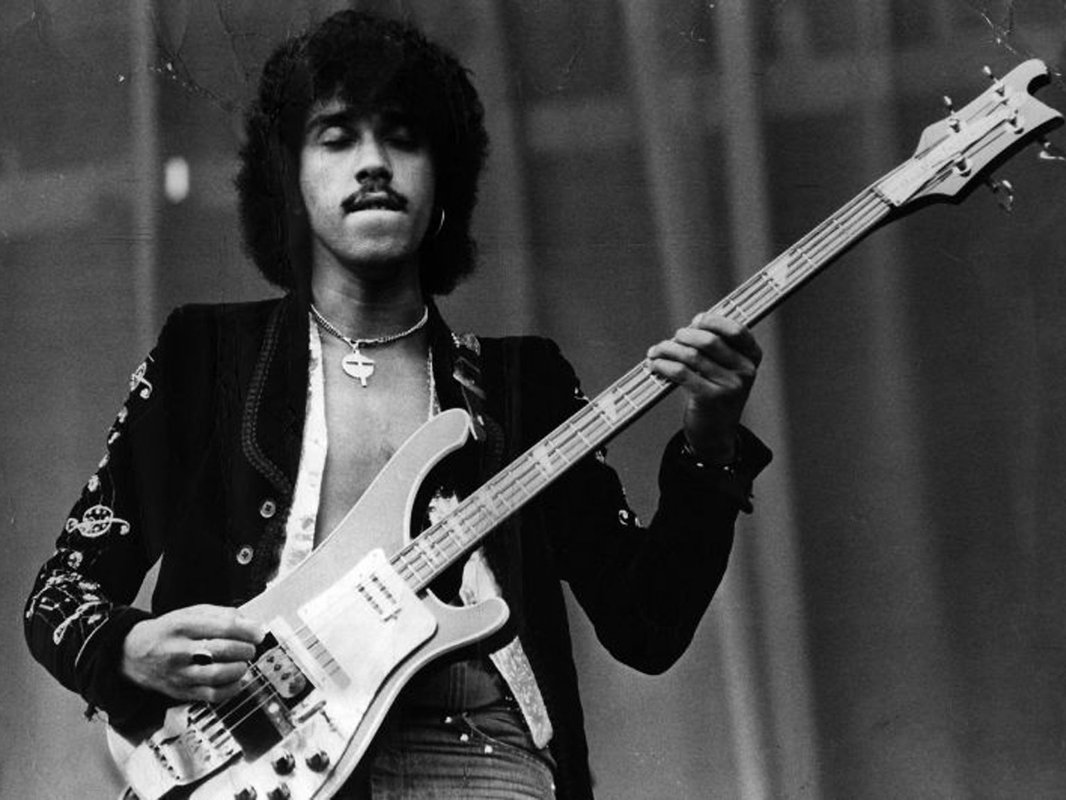 Phil Lynott (1951 - 1986) on stage with Thin Lizzy