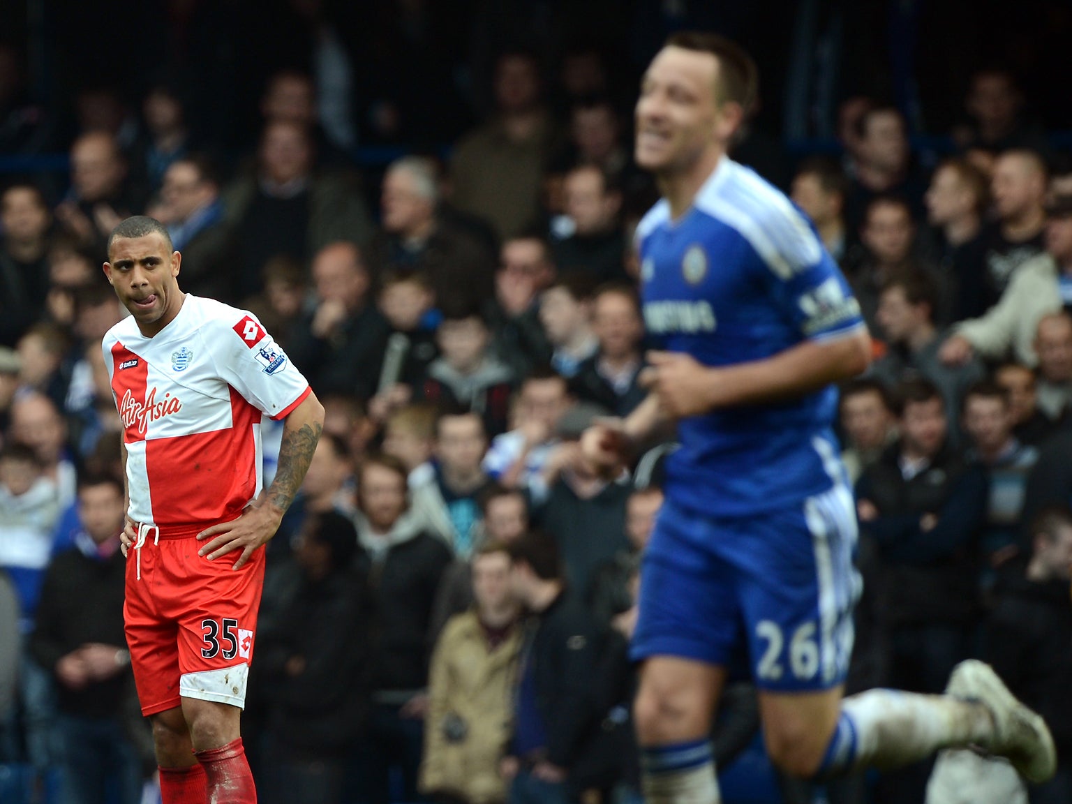 29 April 2012: Anton Ferdinand (left) looks on as John Terry during the Premier League match between Chelsea and QPR