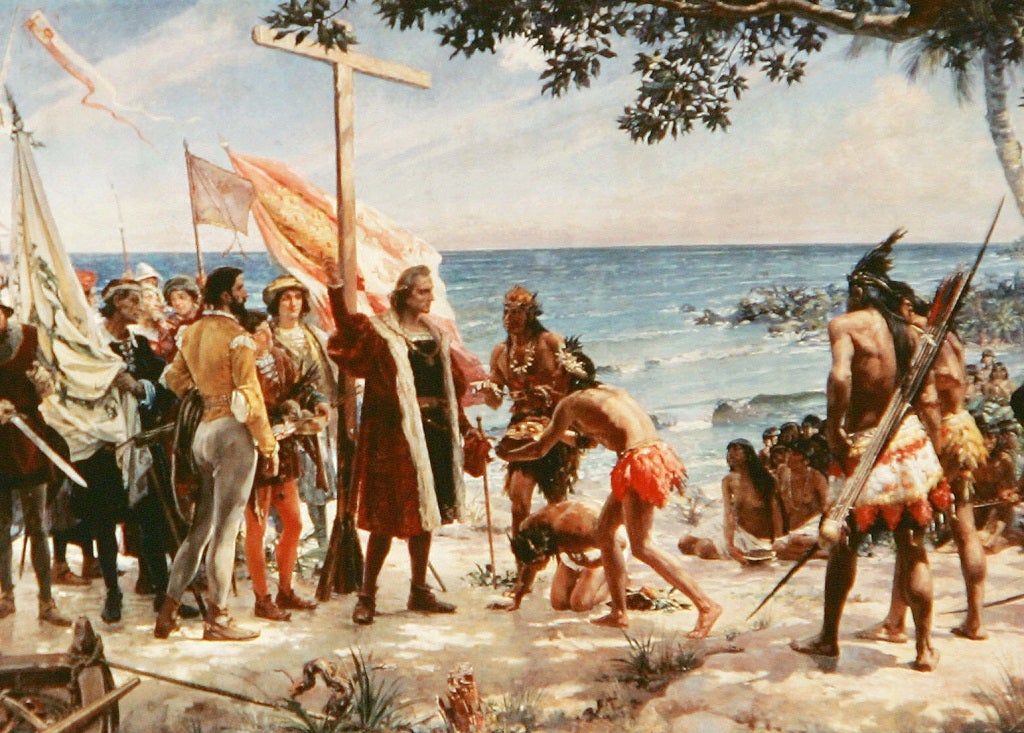 An undated painting shows Christopher Columbus arriving at one of the Caribbean islands on his voyage of discovery