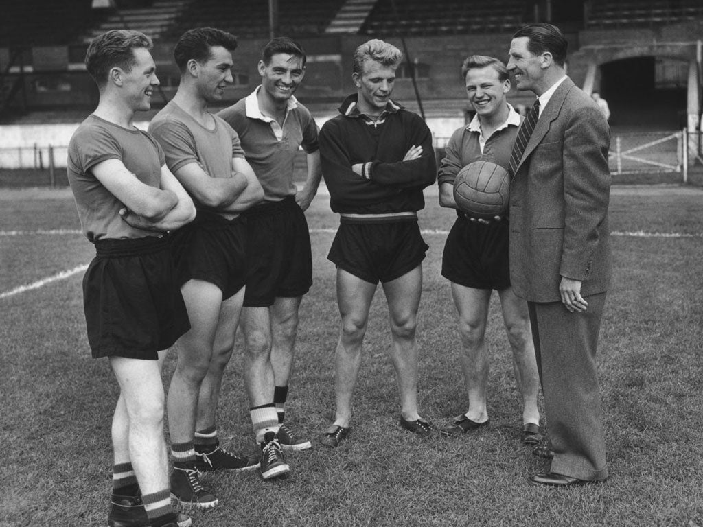 Tindall, third from the left, with his Chelsea team-mates and the manager, Ted Drake, in 1956