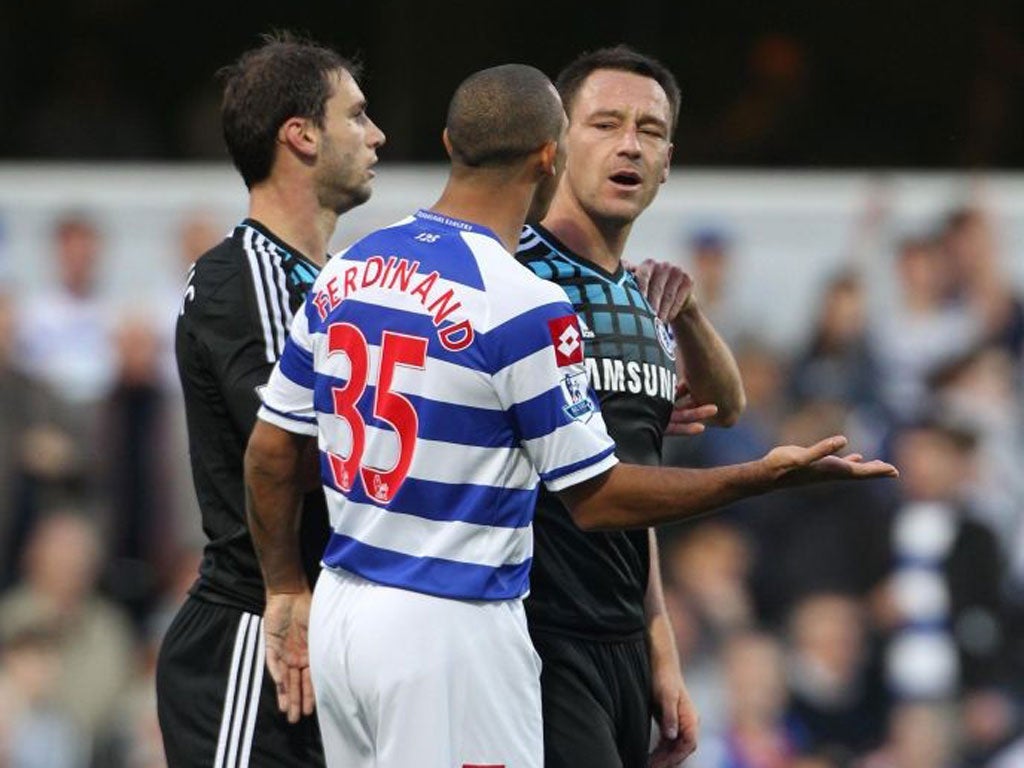 John Terry and Anton Ferdinand during their infamous clash at Loftus Road on 23 October 2011