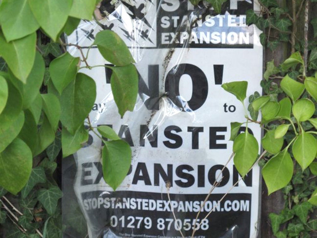 A poster opposing expansion near Stansted airport