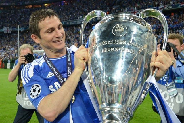 A giant step: Frank Lampard proudly holds the Champions' League trophy after last season's amazing victory