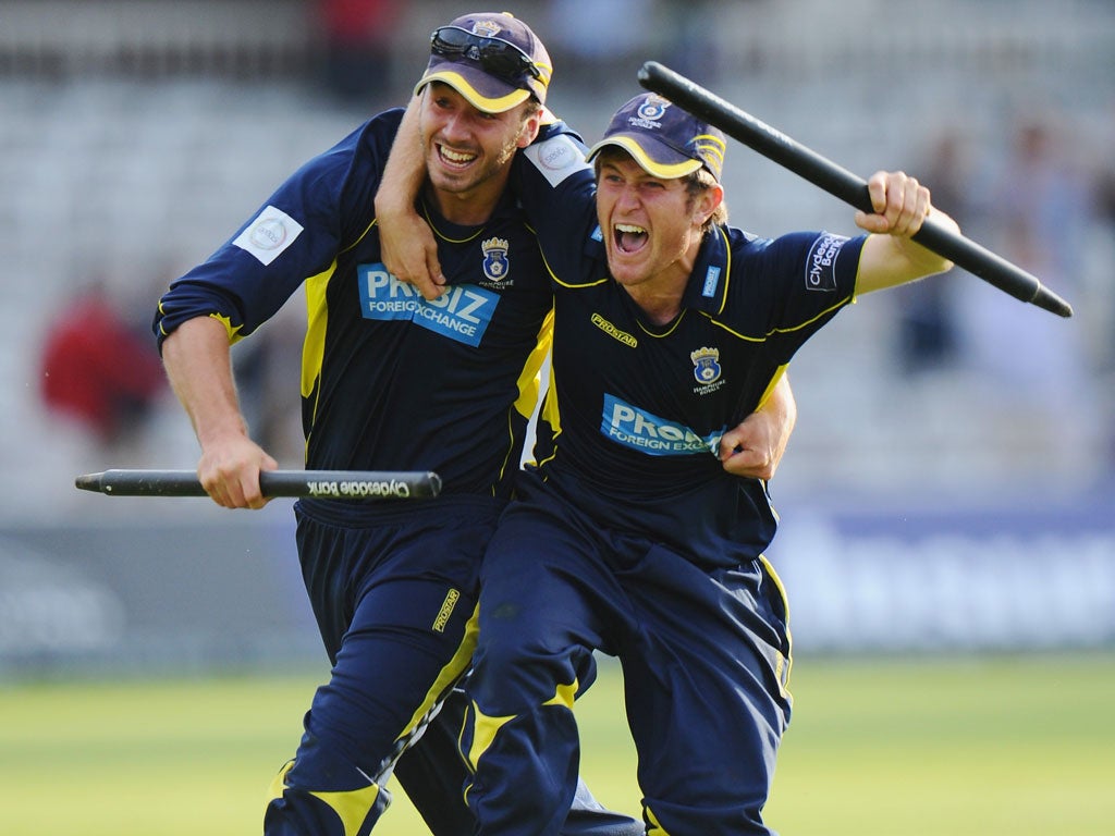 Wicket takers: James Vince (left) and Liam Dawson of Hampshire celebrate victory off the last ball