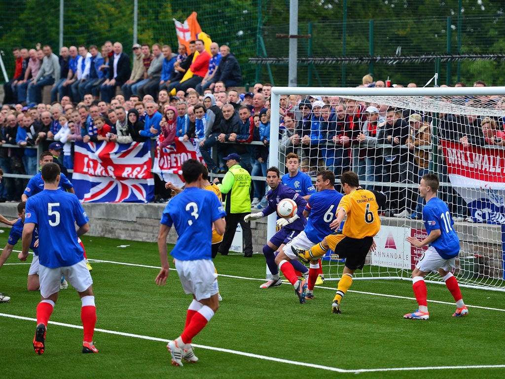 Blockade: Scott Chaplain of Annan is thwarted by Lee McCulloch and Neil Alexander of Rangers