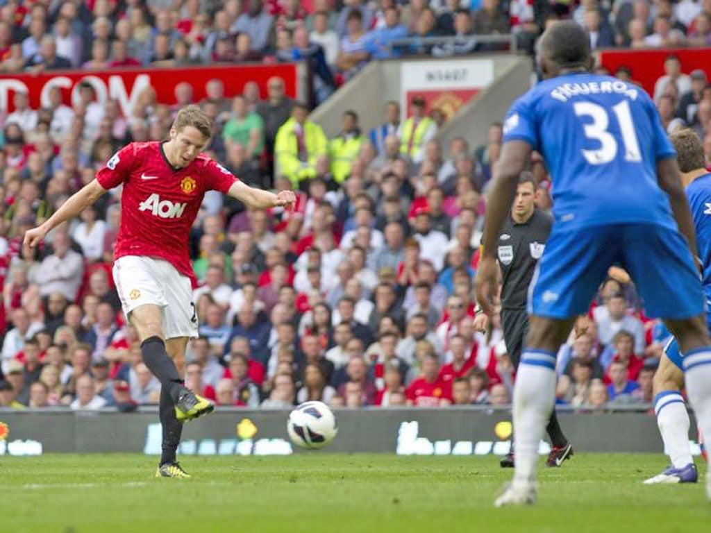 Nick Powell scores his first goal for United while Paul Scholes celebrates scoring on his 700th appearance