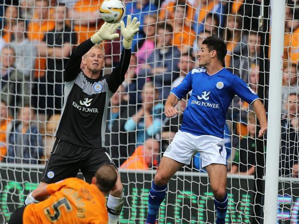 Leicester goalkeeper Kasper Schmeichel is beaten by Wolves’ Richard Stearman