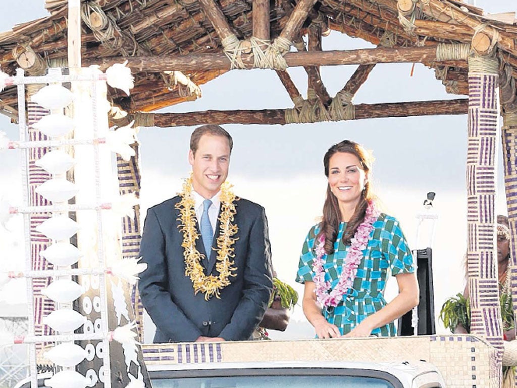 Prince William and Kate in the Solomon Islands yesterday. Legal action on their behalf will start today