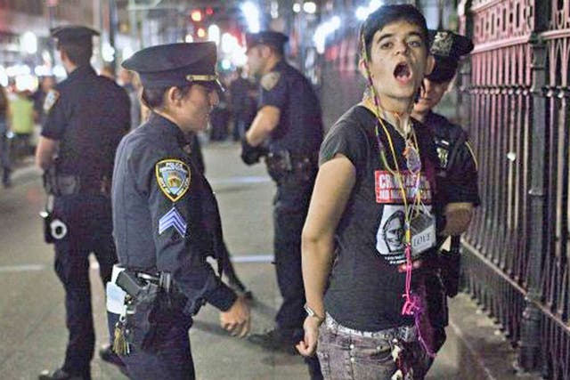 An Occupy protester is arrested on Broadway during a march to Zuccotti Park at the weekend
