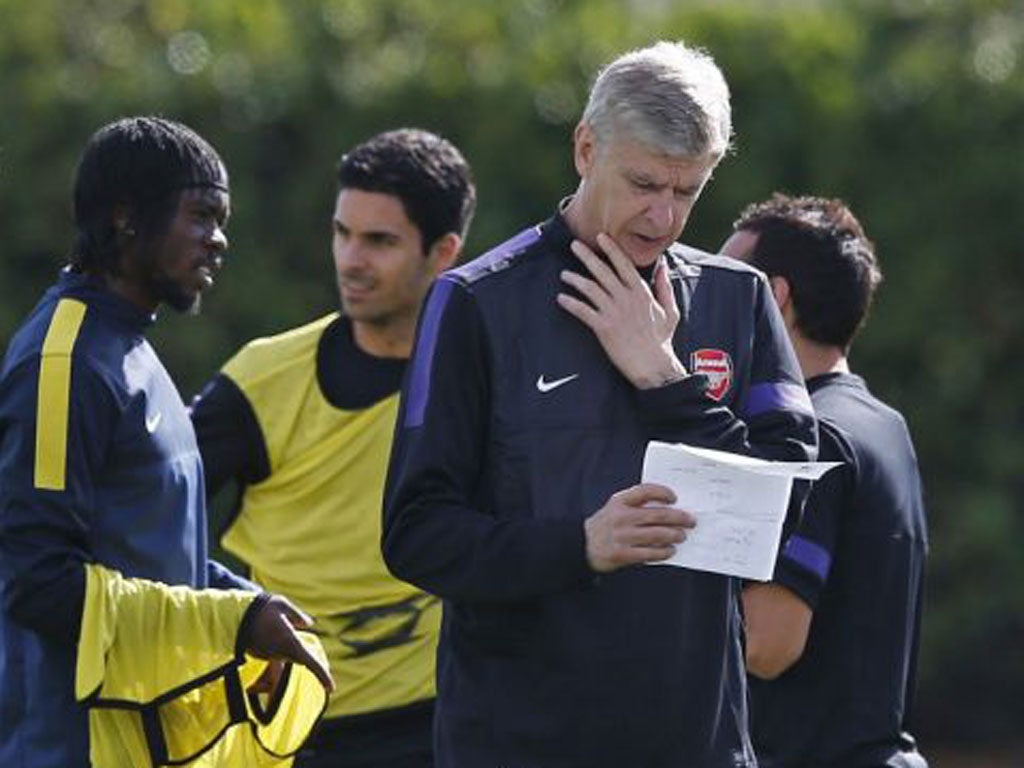 Arsenal manager Arsène Wenger ponders his options before his side face Montpellier