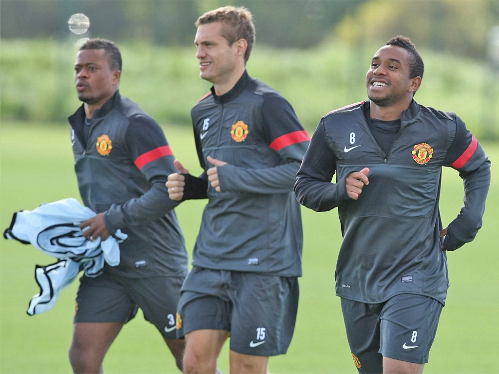 Nemanja Vidic (centre) is a key figure if United are to do well