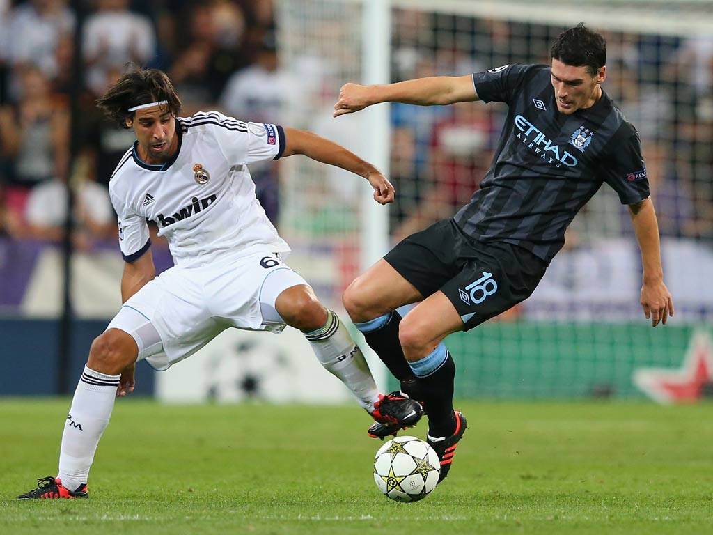 Manchester City midfielder Gareth Barry in action against Real Madrid