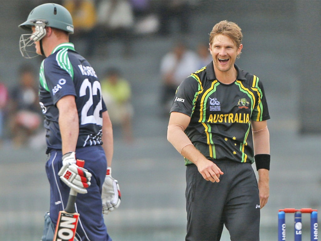 Shane Watson celebrates the wicket of Ireland's Kevin O'Brien