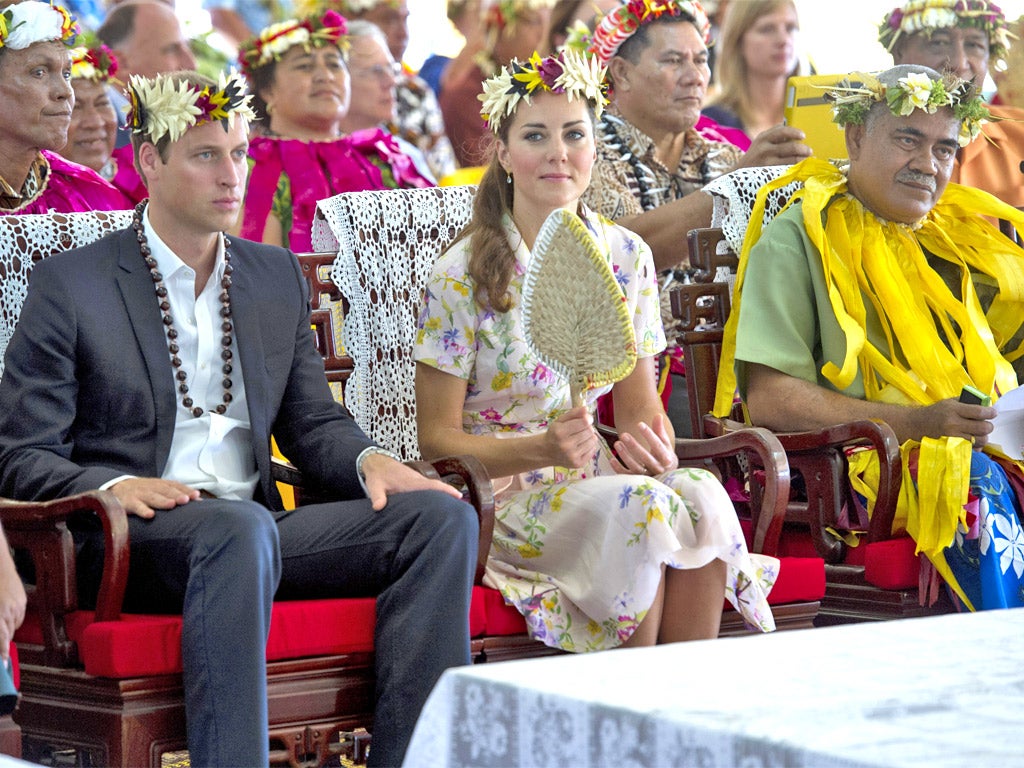 The Duke and Duchess of Cambridge receive gifts as they bid farewell to Tuvalu yesterday at the end of their Diamond Jubilee tour