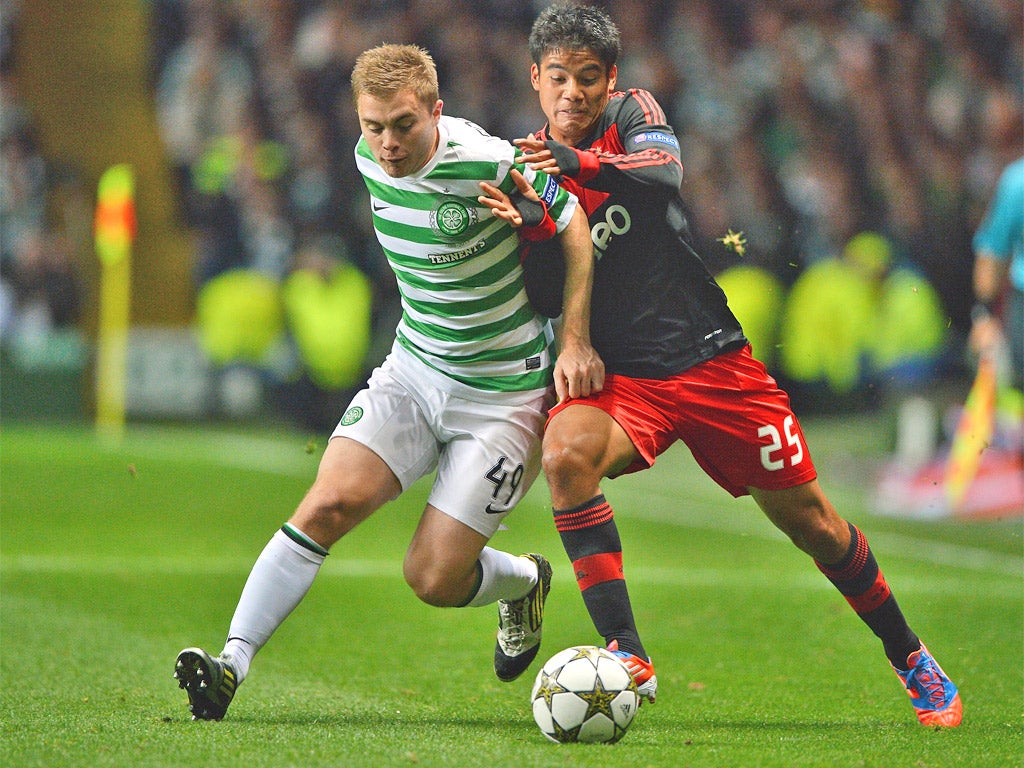 James Forrest troubles Benfica with his pace at Celtic Park