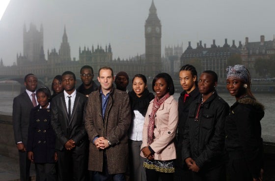 Martin Lewis, flanked by eager student money-savers