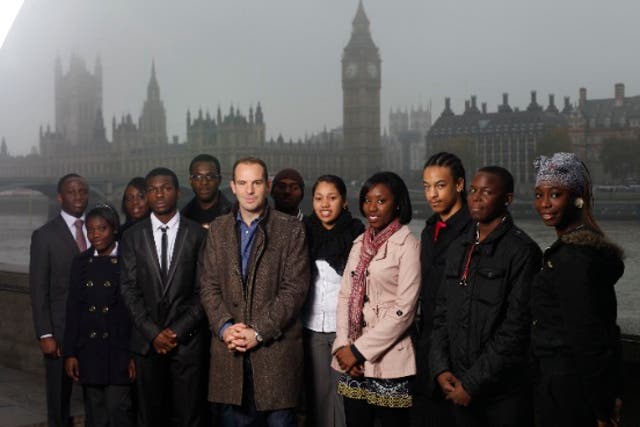 Martin Lewis, flanked by eager student money-savers