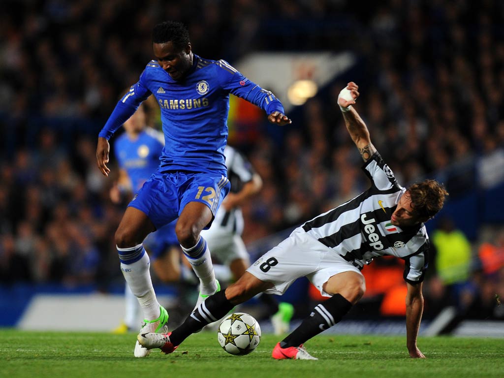Chelsea midfielder John Obi Mikel in action against Juventus